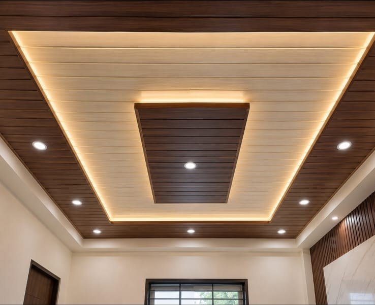 Layered wood-tone ceiling with stepped cove lighting in a Jamaican residence